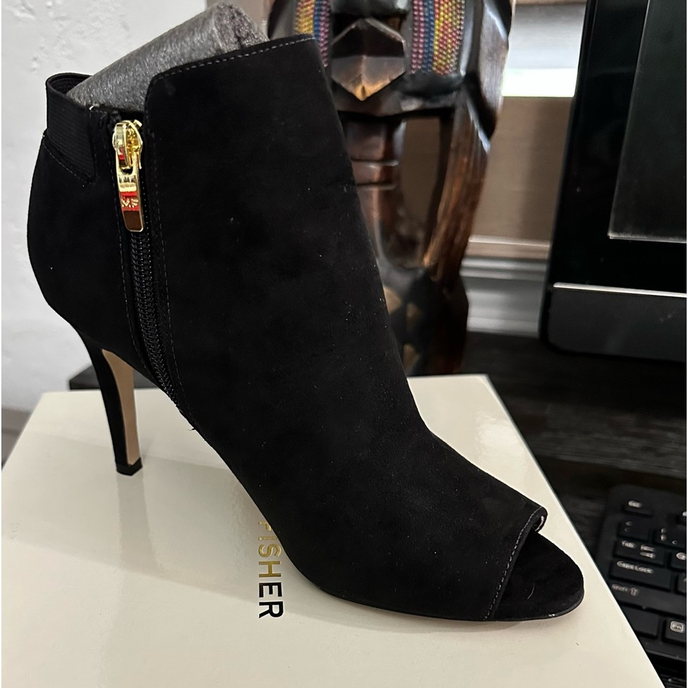 Beautiful black Marc Fisher peep toes. Only tried on, never worn outside.